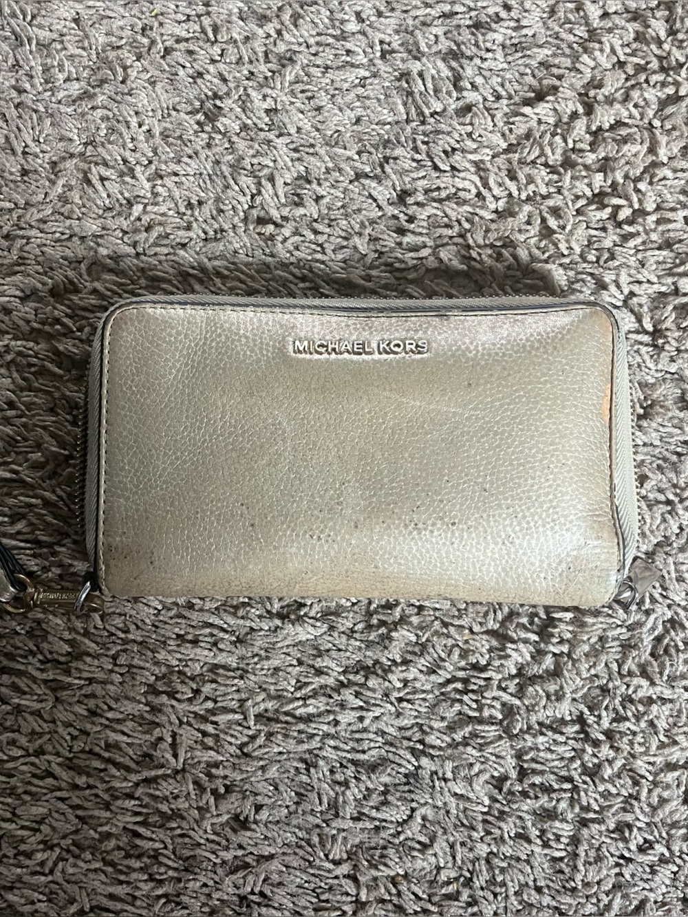 Michael Kors Metallic Pebble Leather Wristlet in gold -Tone